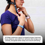 A person wearing the AV Edge Advanced Sky Blue frequency wristband while adjusting a riding helmet, showcasing how the geometric HEF Technology design might support improved focus, balance, and coordination for active sports and high-performance activities.
