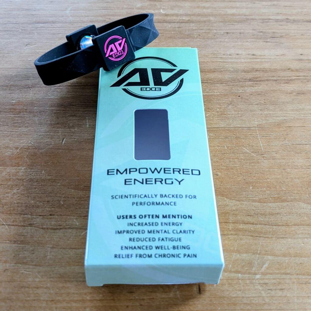 AV Edge Legend Wellness Wristband in Black/Pink unboxed