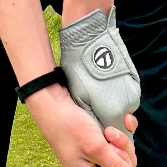 Alfie Dacey wearing the AV Edge Legend Golfers bracelet that gained him 30 yards of distance, and improve balance and speed