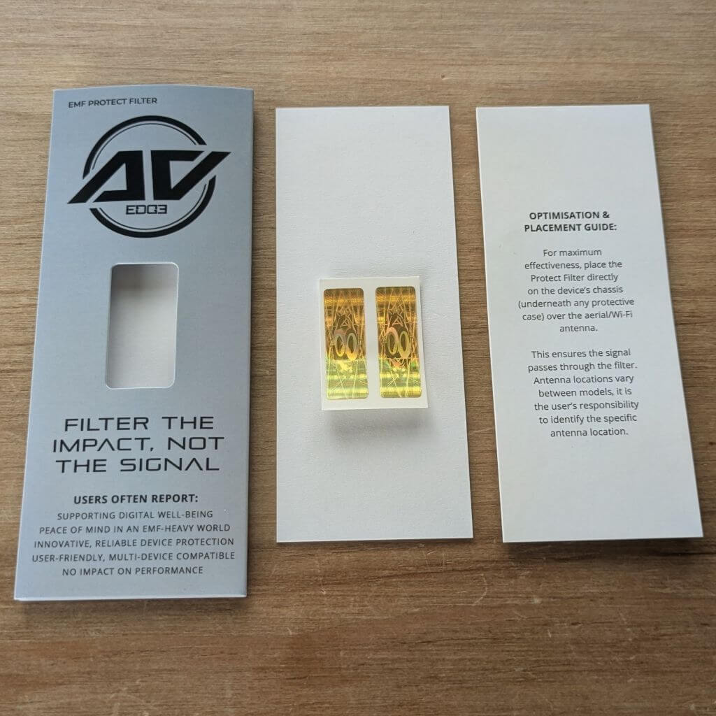 AV Edge EMF Protect Filter for cell phones removed from packaging, showing the sleek, ultra-slim rectangular design with embedded EF Technology for 4G, 5G, and WiFi digital stress modulation.