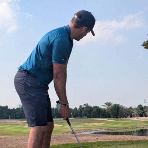 Chris Hanson playing golf in Dubai with his AV Edge golfers Bracelet that is backed by a scientific study showing "increased club head speed" for golfers.