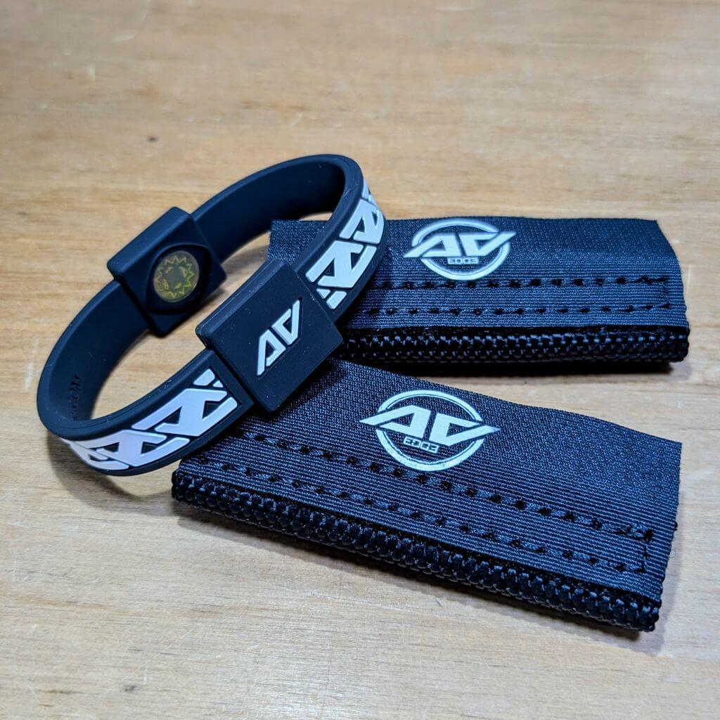 Horse and Rider Set showing a black Legend frequency technology wristband alongside two black equine bridle/headcollar patches with embroidered AV Edge logos.